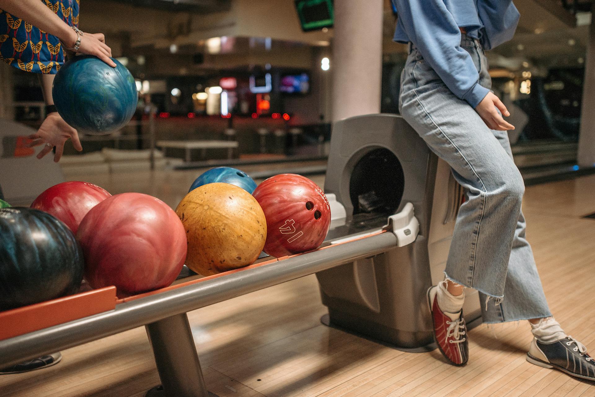 picture of bowling balls in rack